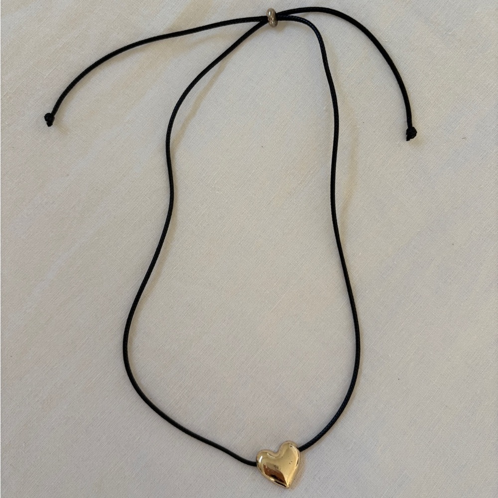 Gold Heart Pendant Necklace on a black adjustable cord